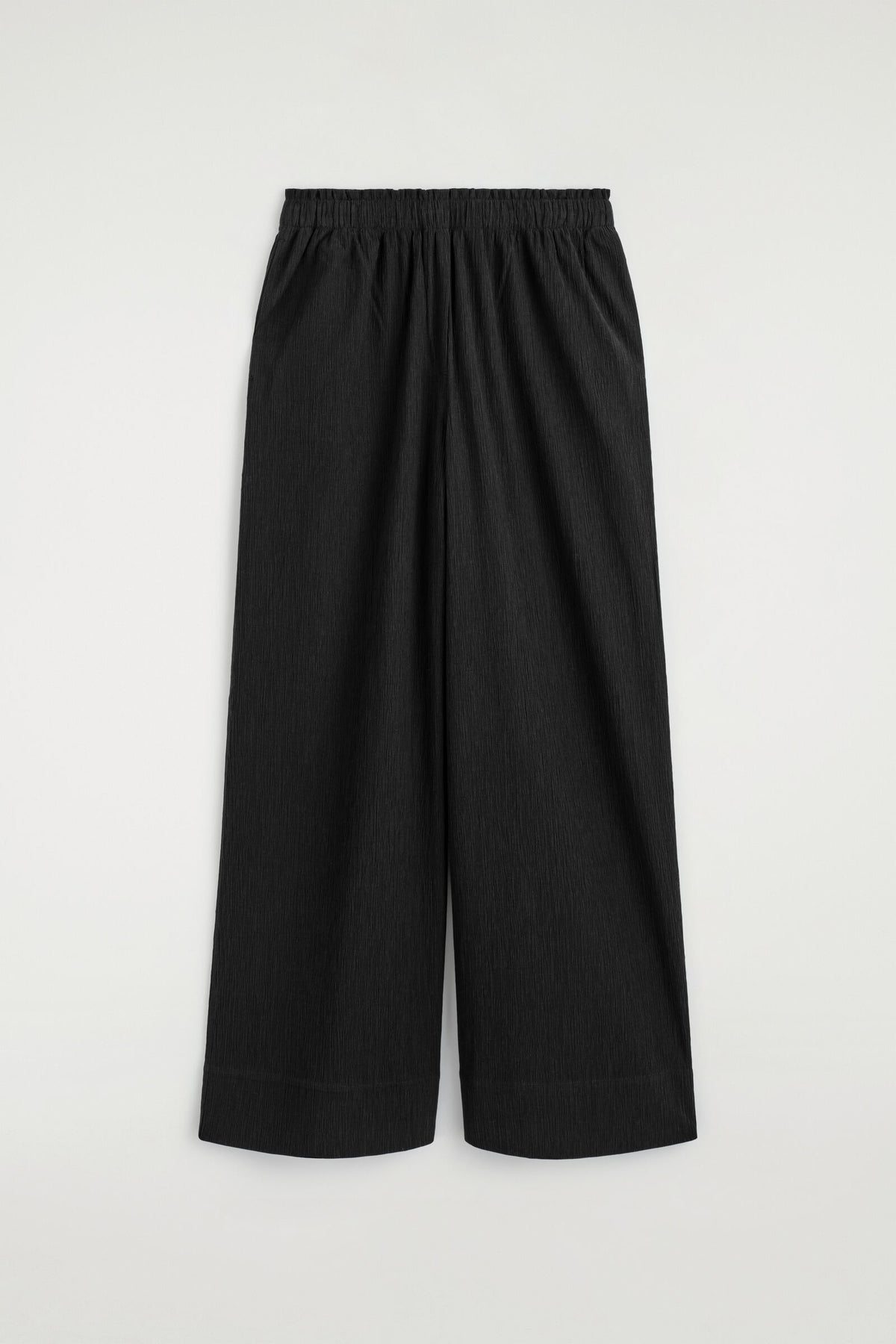 PANTALONES DE JERSEY ARRUGADO DE PIERNA ANCHA - NEGRO | DescriptiveStillLife