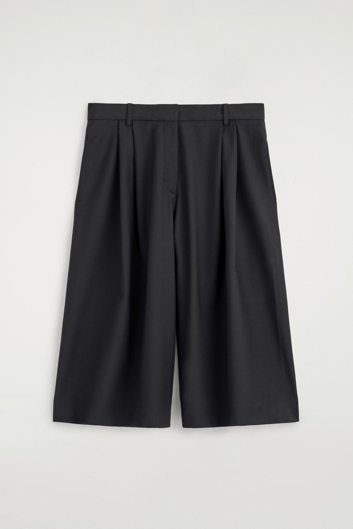 PANTALONES CULOTTE DE LANA PLISADA - NEGRO | DescriptiveStillLife