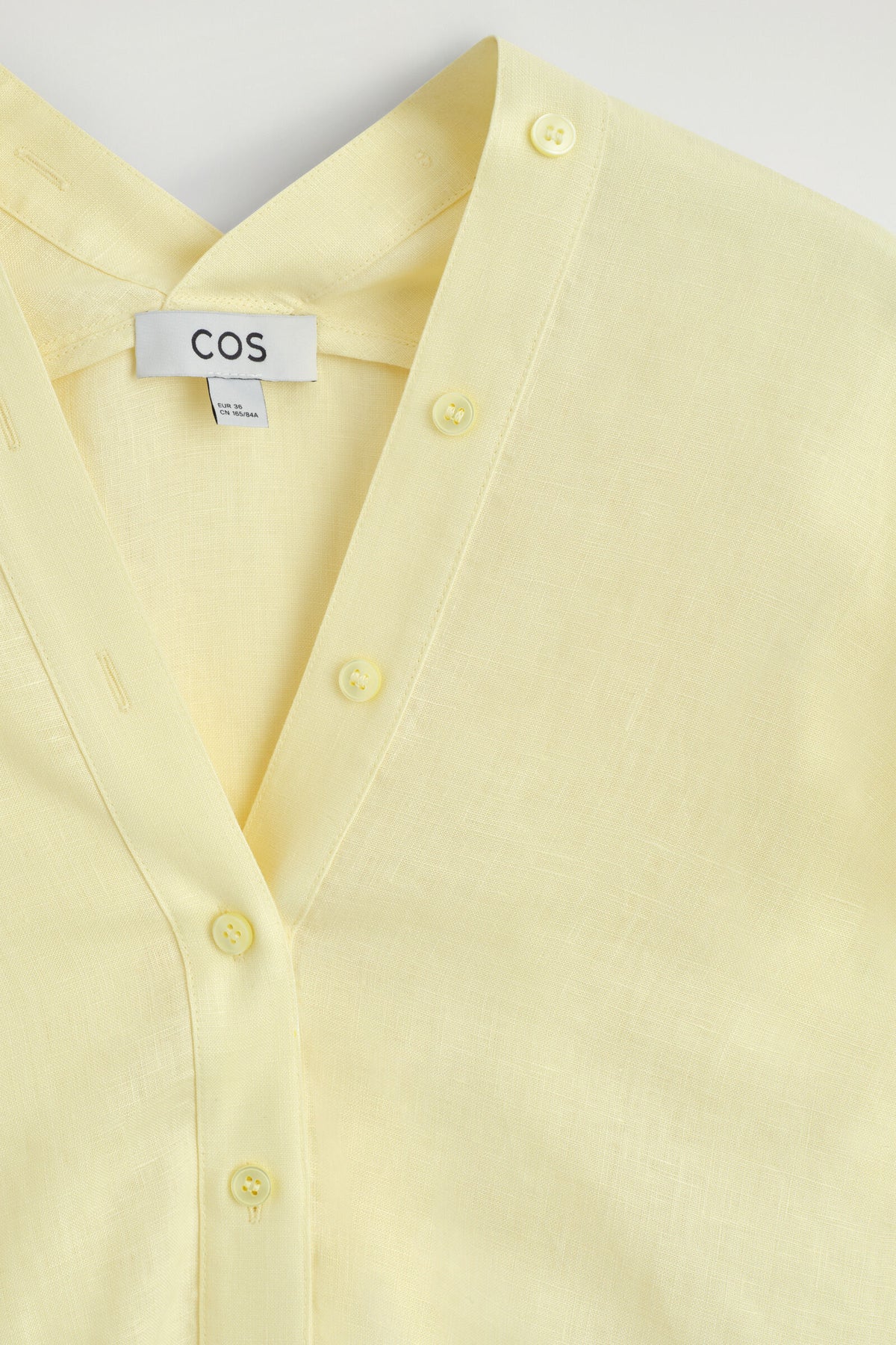 CAMISA DE LINO CON DETALLE DE BOTÓN - AMARILLO | DescriptiveDetail
