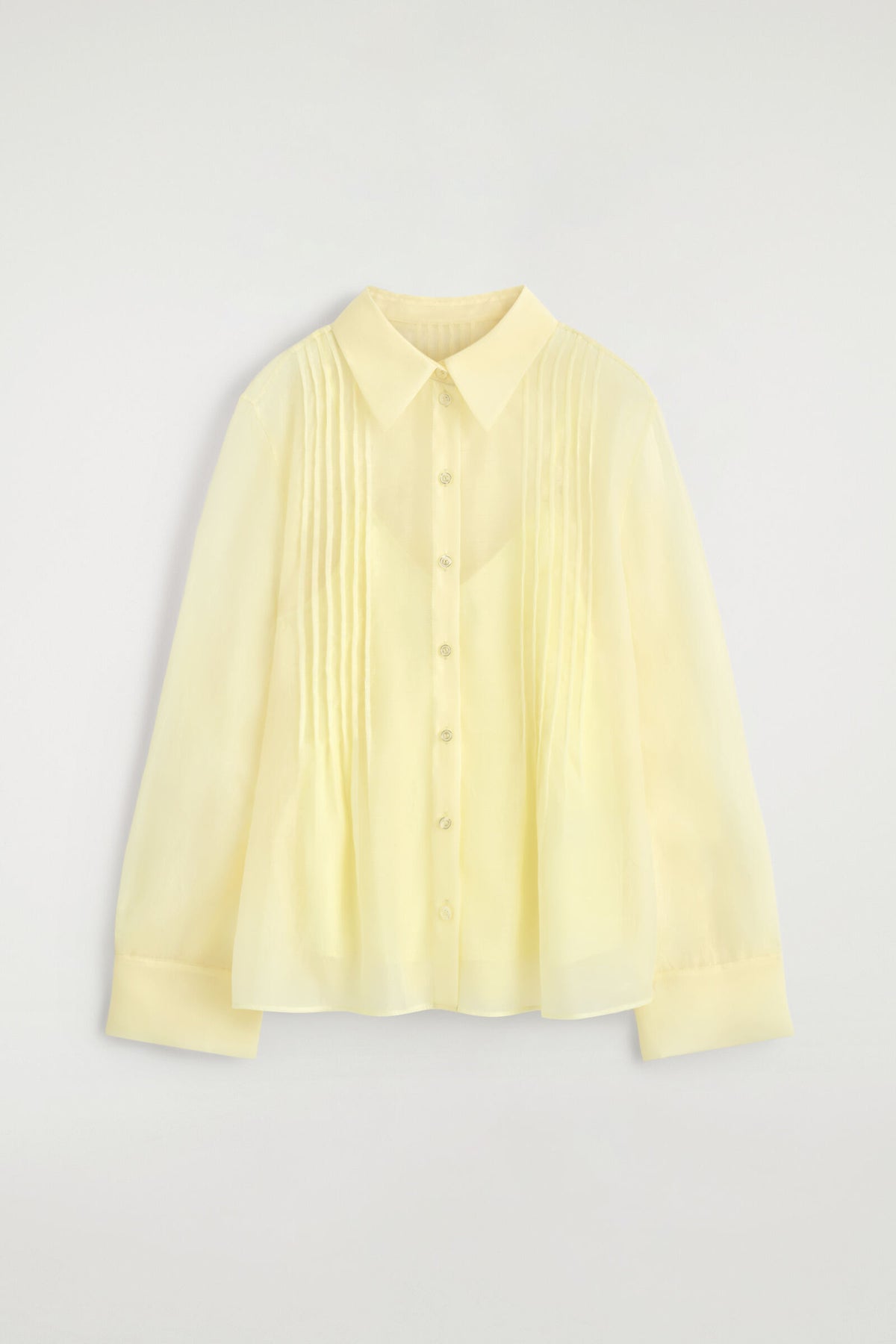 CAMISA TRANSPARENTE CON PLISADOS - AMARILLO | DescriptiveStillLife