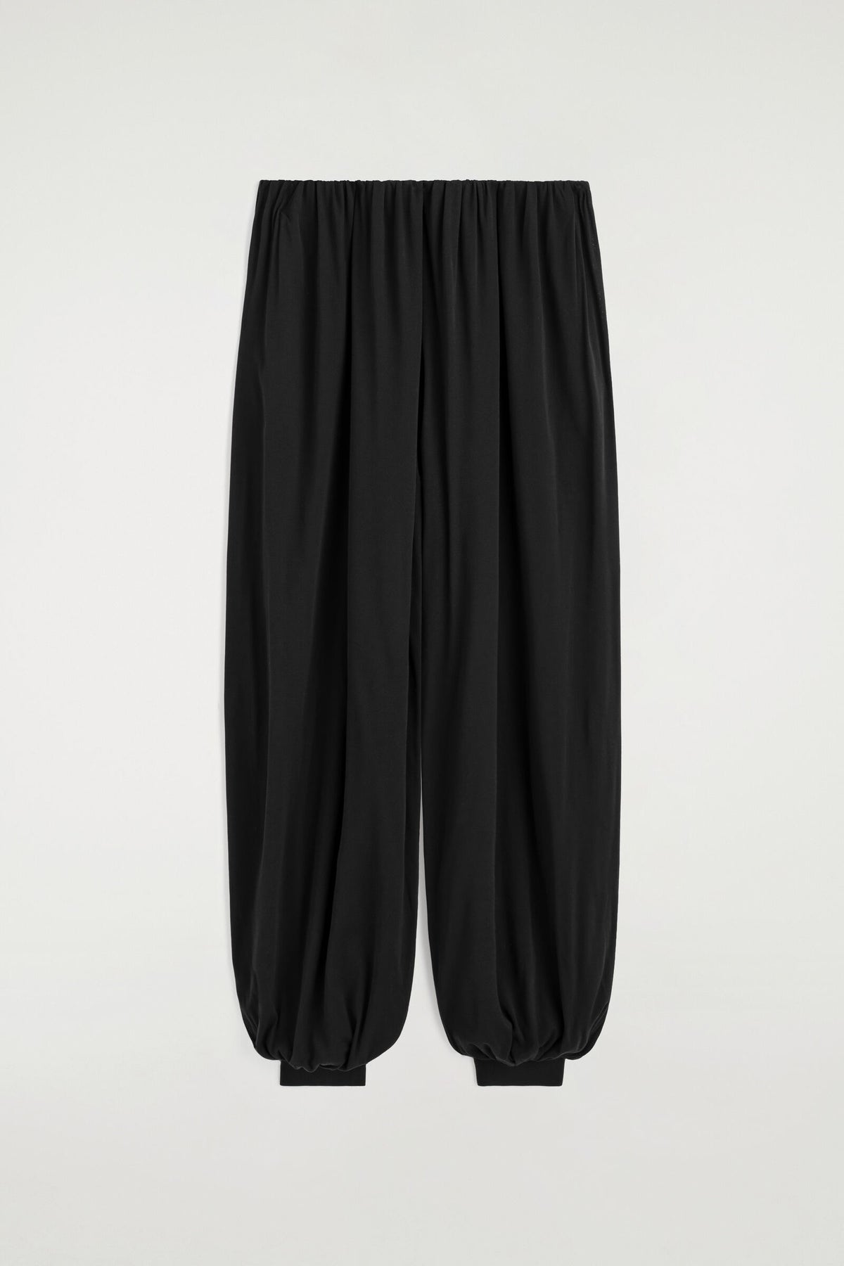 PANTALONES DE JERSEY CON VOLUMEN RECOGIDO - NEGRO | DescriptiveStillLife