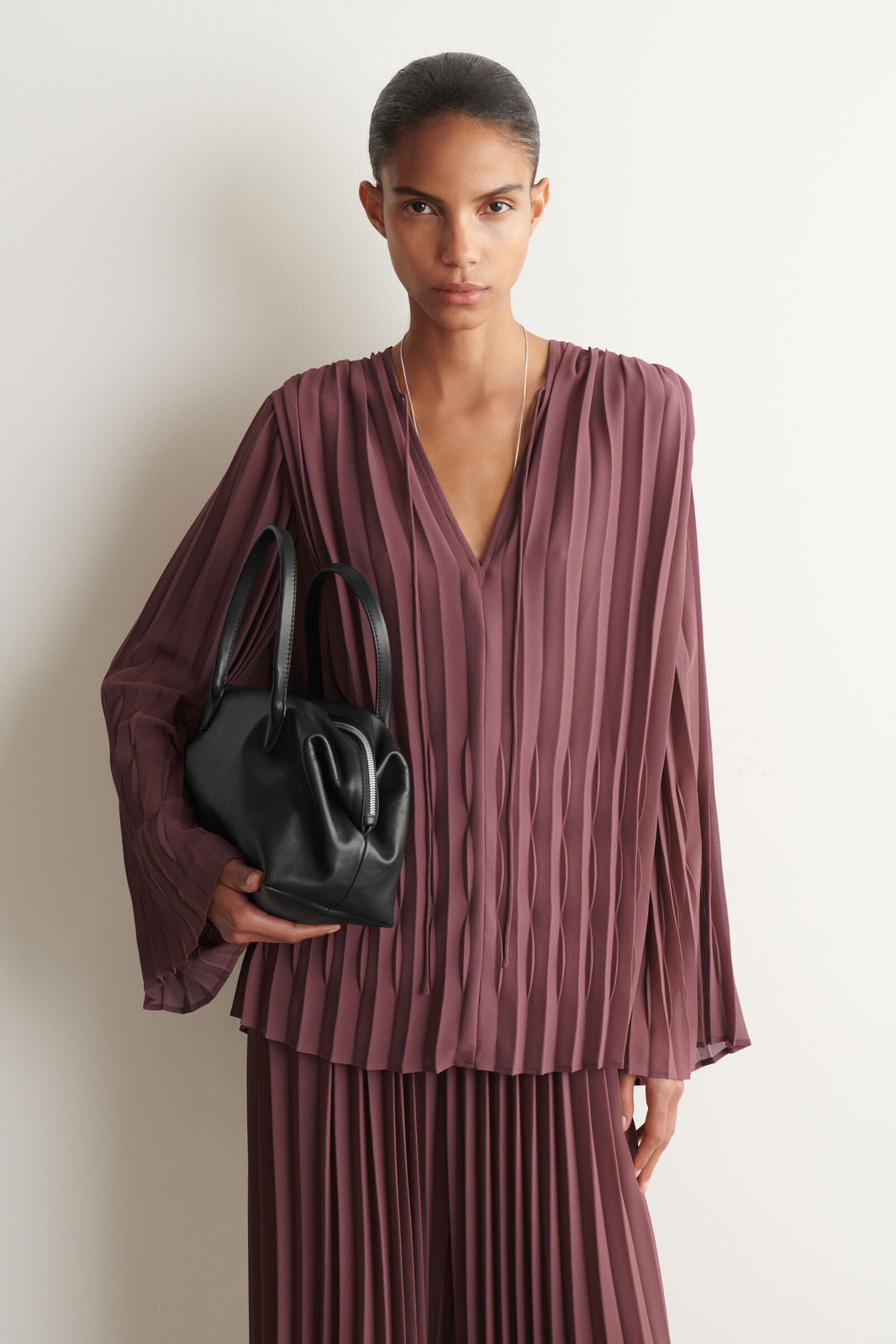 BLUSA DE GEORGETTE PLISADA CON LAZO - ÓXIDO