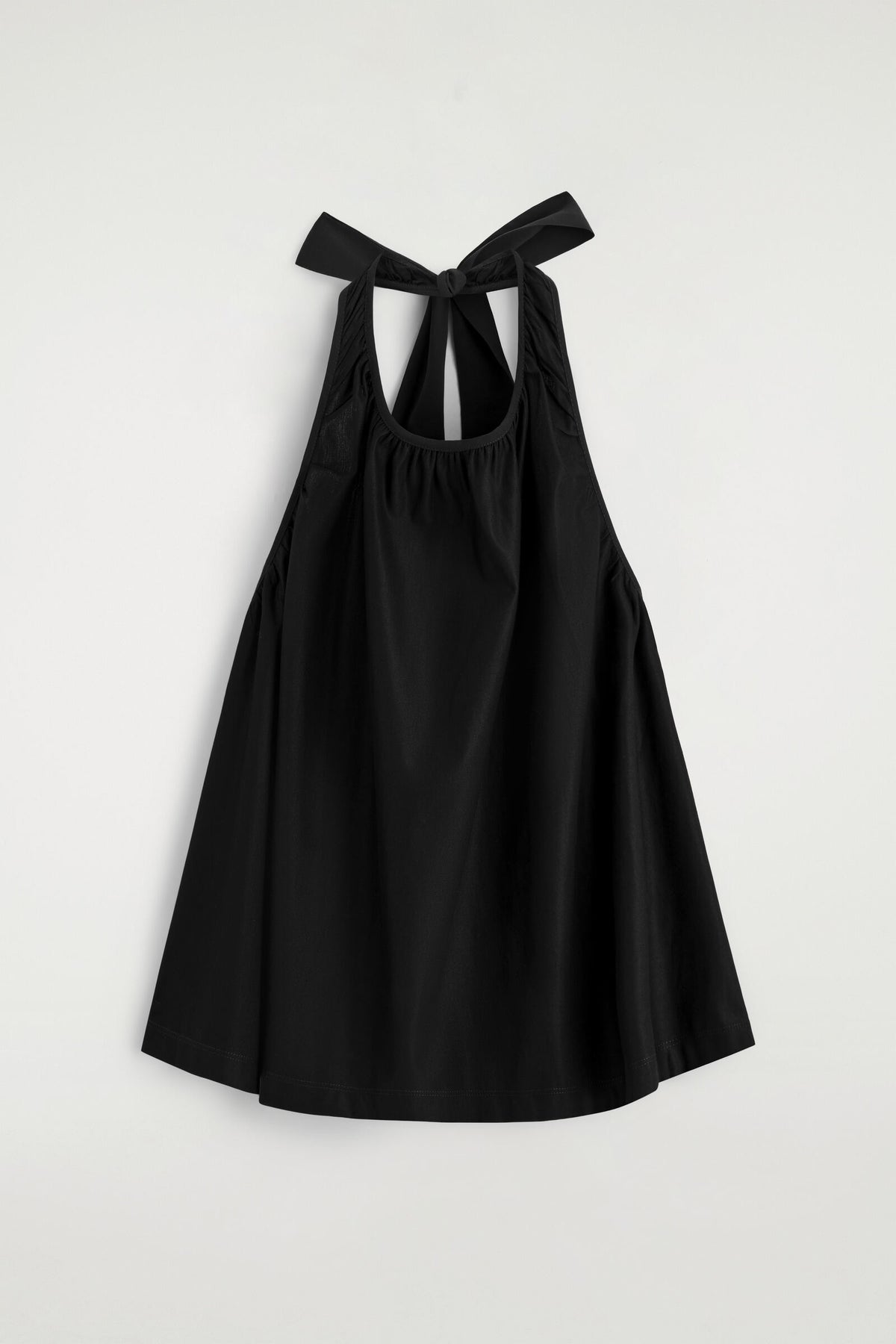 TOP HALTER DE ESPALDA ABIERTA - NEGRO | DescriptiveStillLife