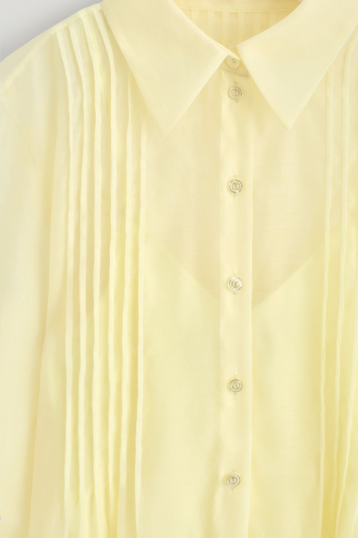 CAMISA TRANSPARENTE CON PLISADOS - AMARILLO | DescriptiveDetail