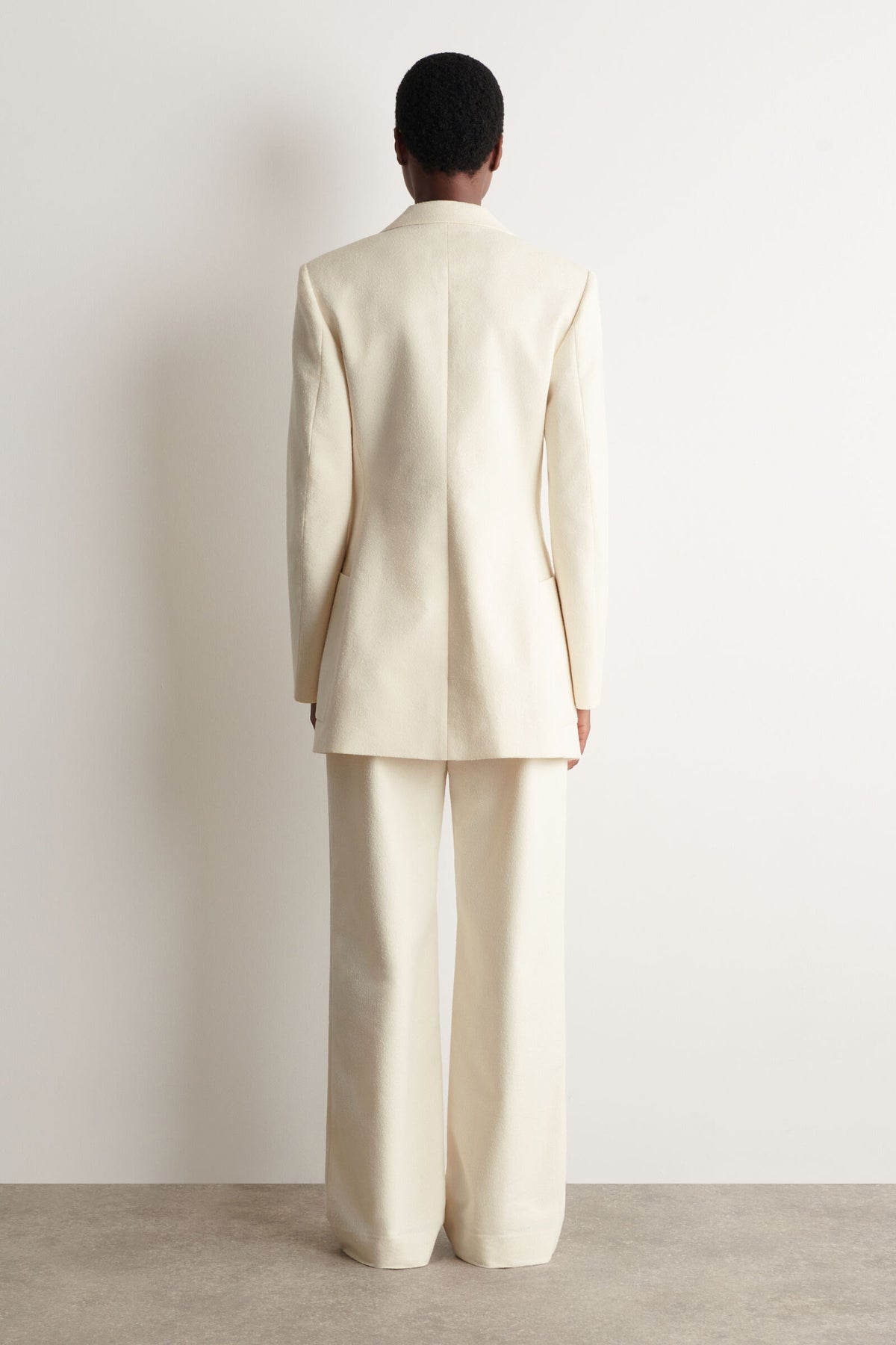 PANTALONES TEXTURIZADOS DE PIERNA SLIM - ECRU