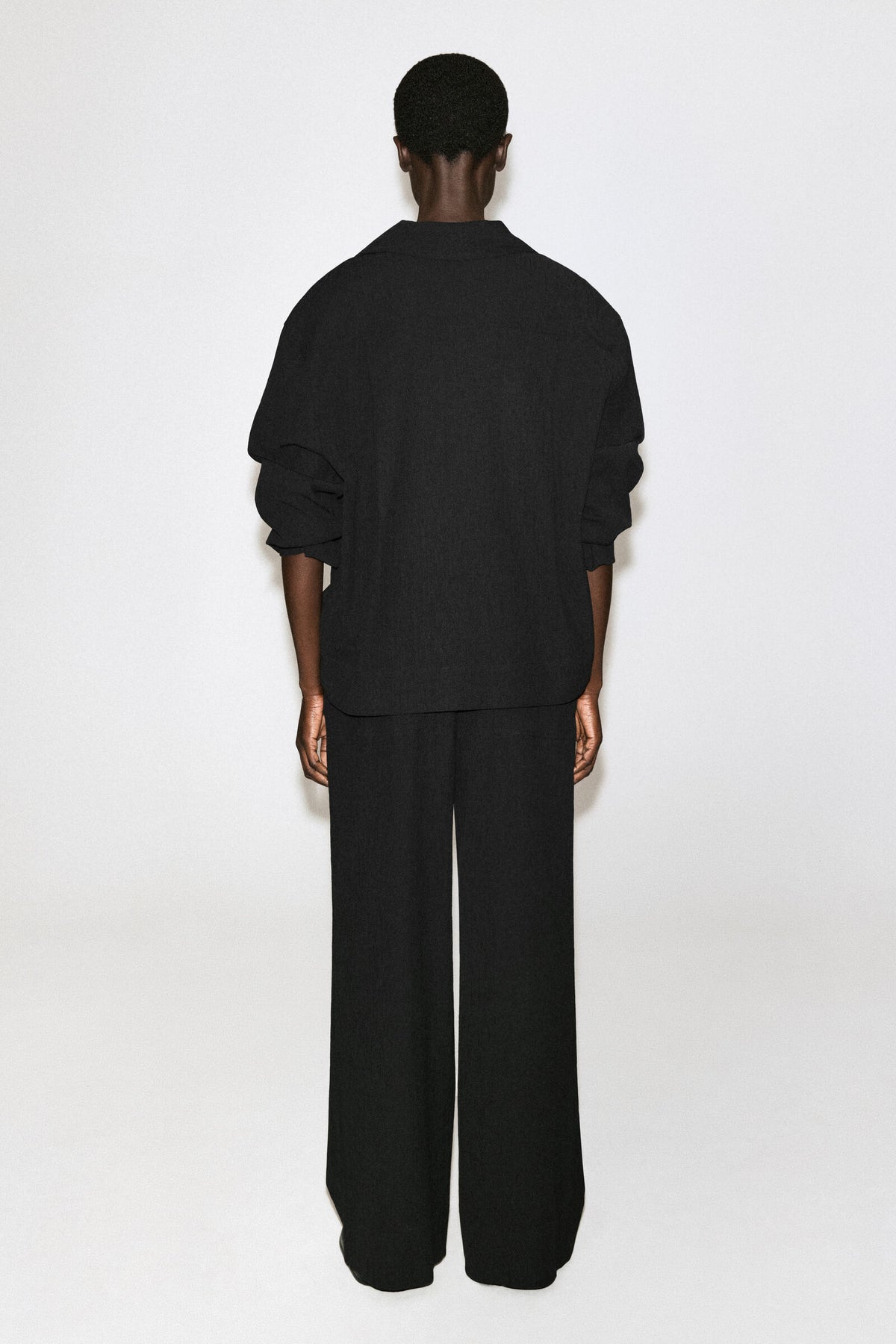 PANTALONES DE JERSEY ARRUGADO DE PIERNA ANCHA - NEGRO