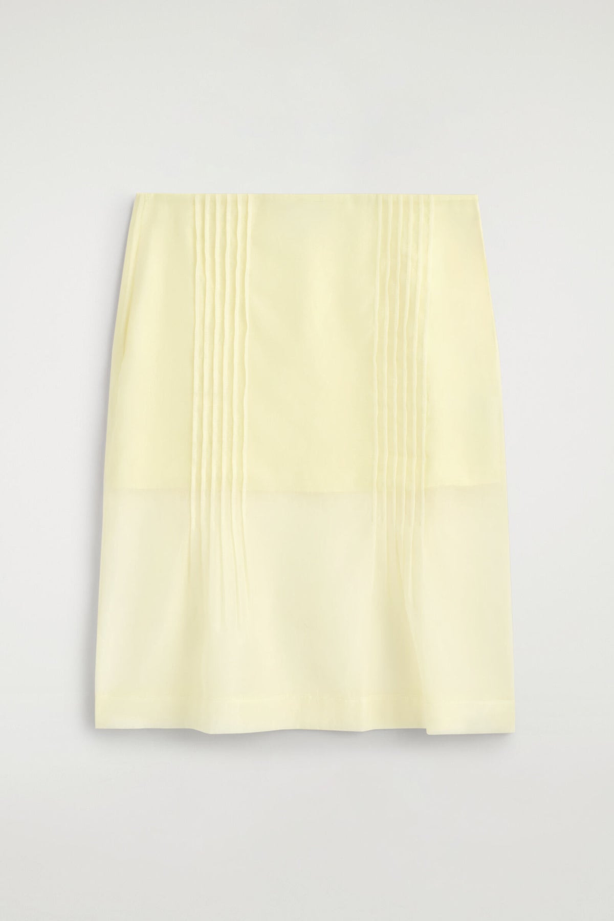 FALDA TRANSPARENTE CON PLISADO - AMARILLO | DescriptiveStillLife