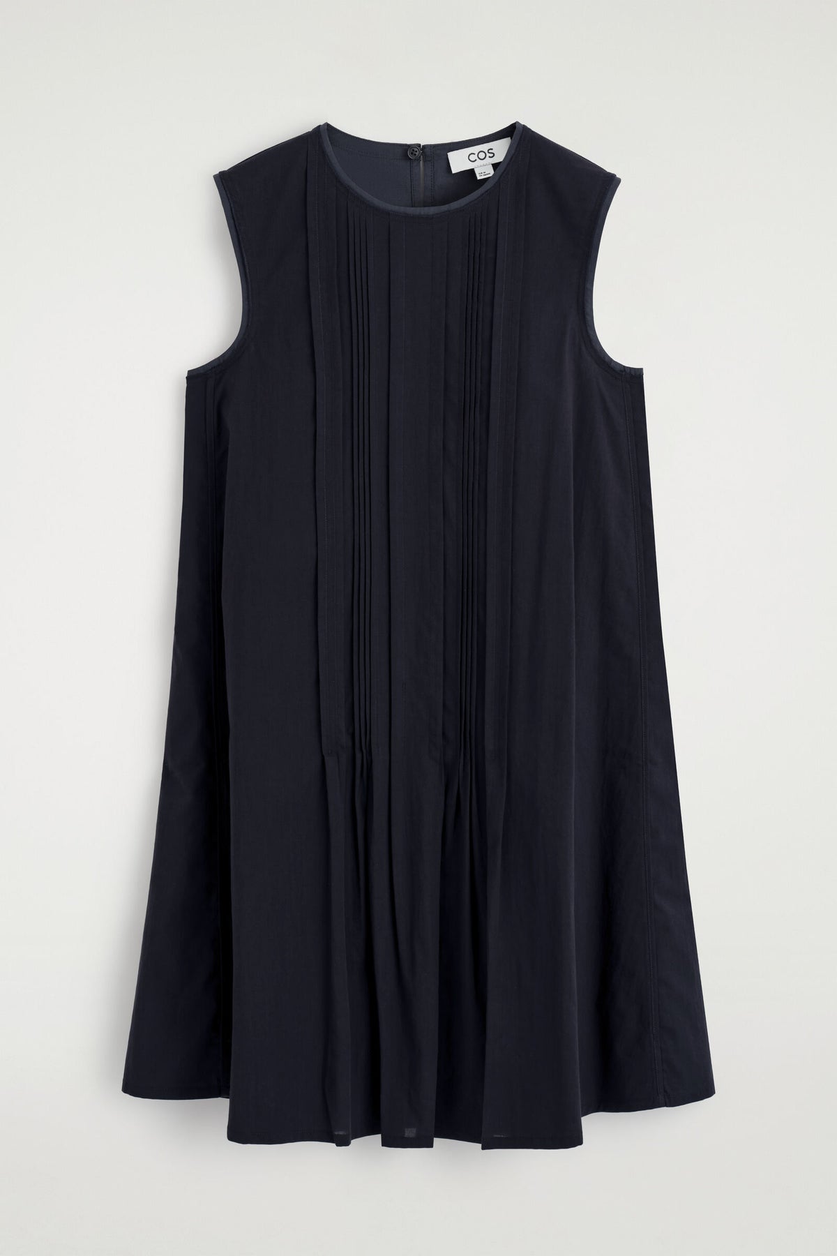 VESTIDO MINI CON PLISADOS Y CAPAS - MARINO | DescriptiveStillLife