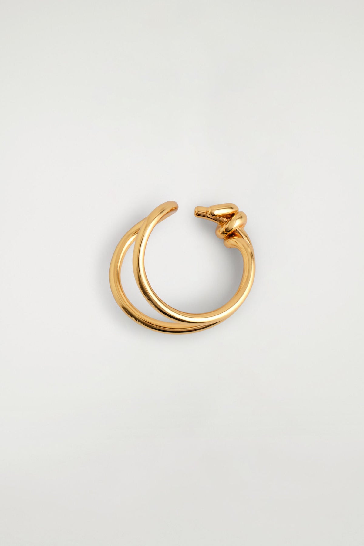 ANILLO CON NUDO - DORADO | DescriptiveStillLife