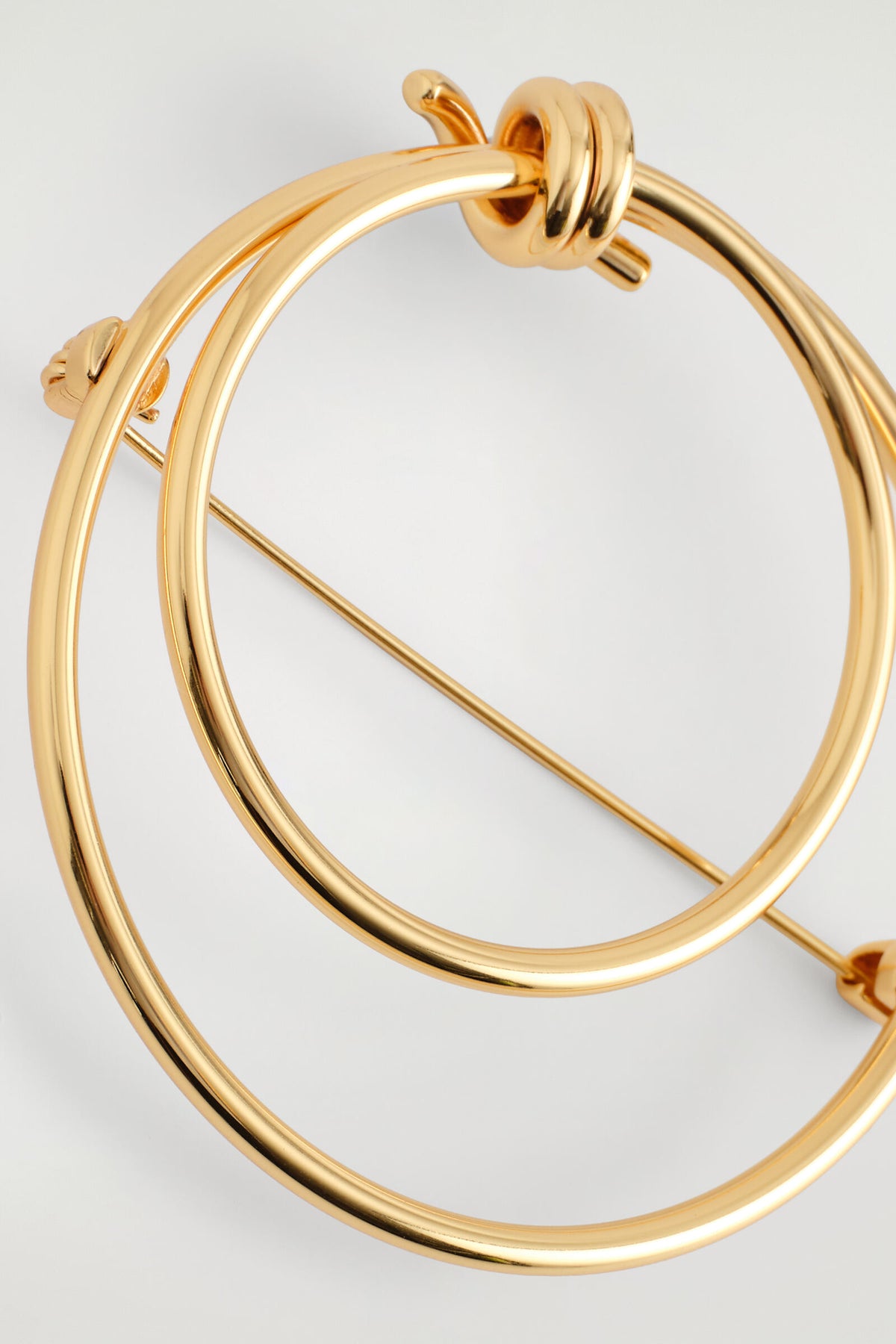 BROCHE ANUDADO - DORADO | DescriptiveDetail