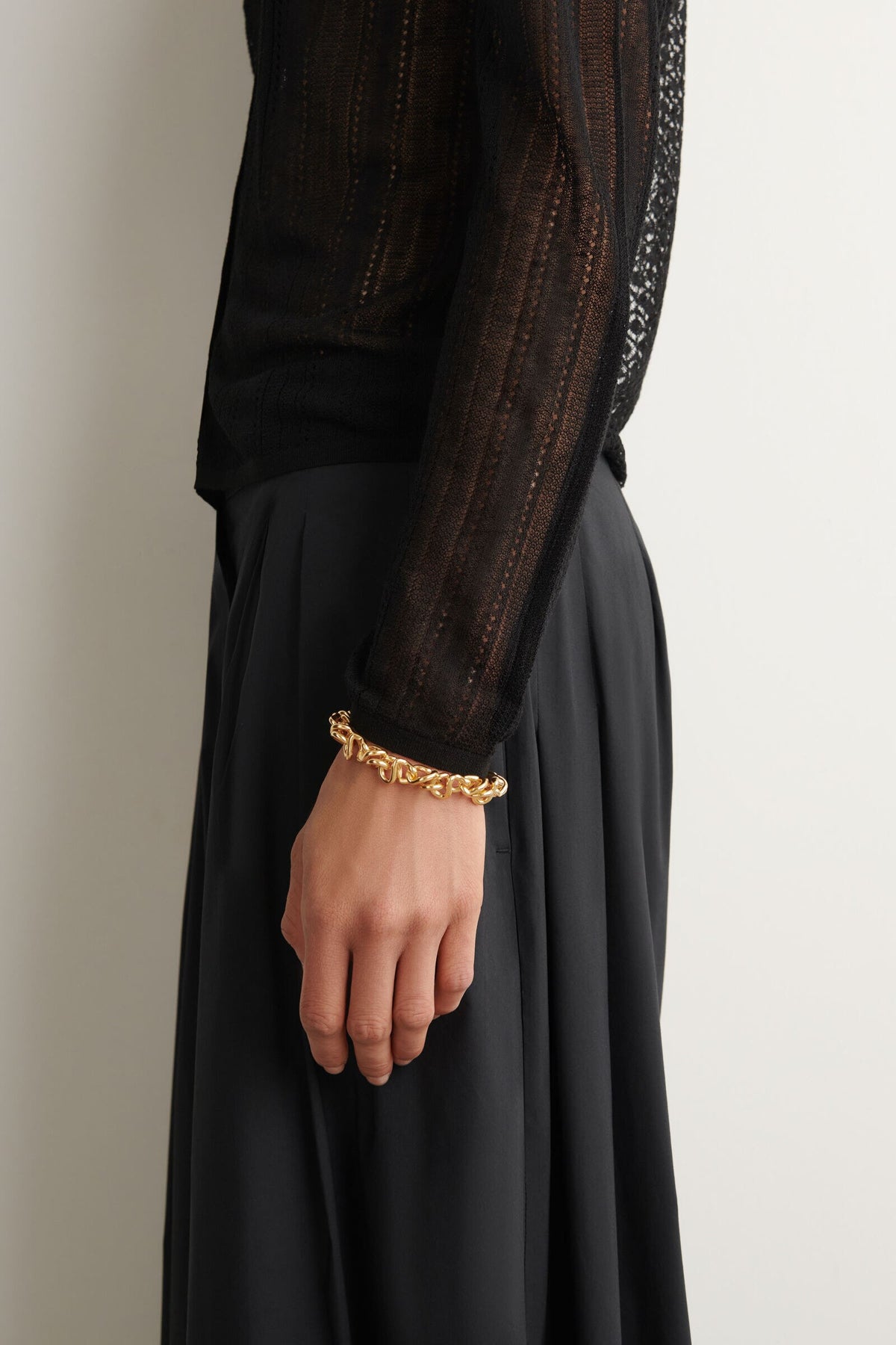 BRAZALETE DE CADENA ANUDADA - DORADO