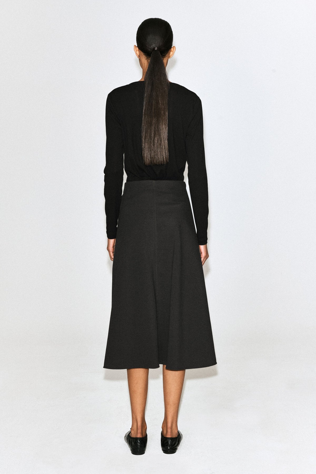 FALDA MIDI DE JERSEY CON DETALLE DE GIRO - VERDE OSCURO