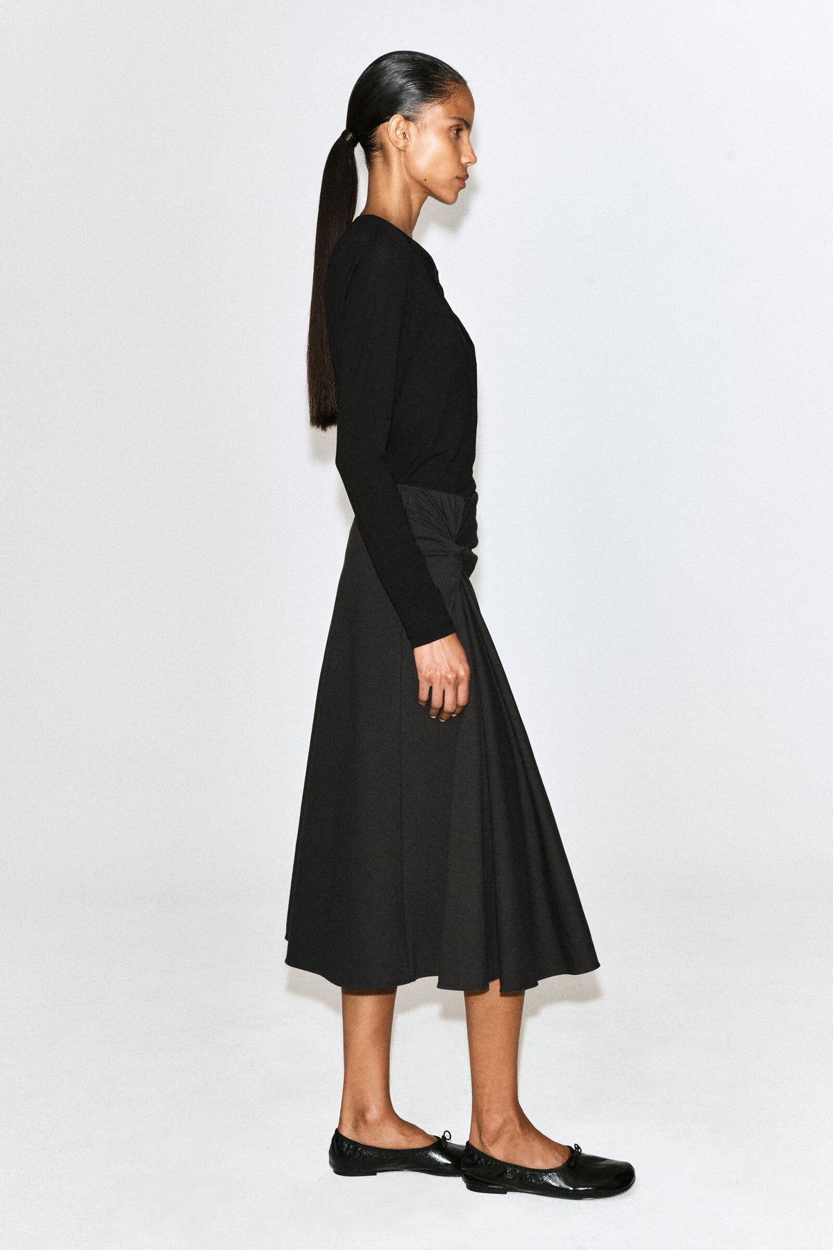 FALDA MIDI DE JERSEY CON DETALLE DE GIRO - VERDE OSCURO