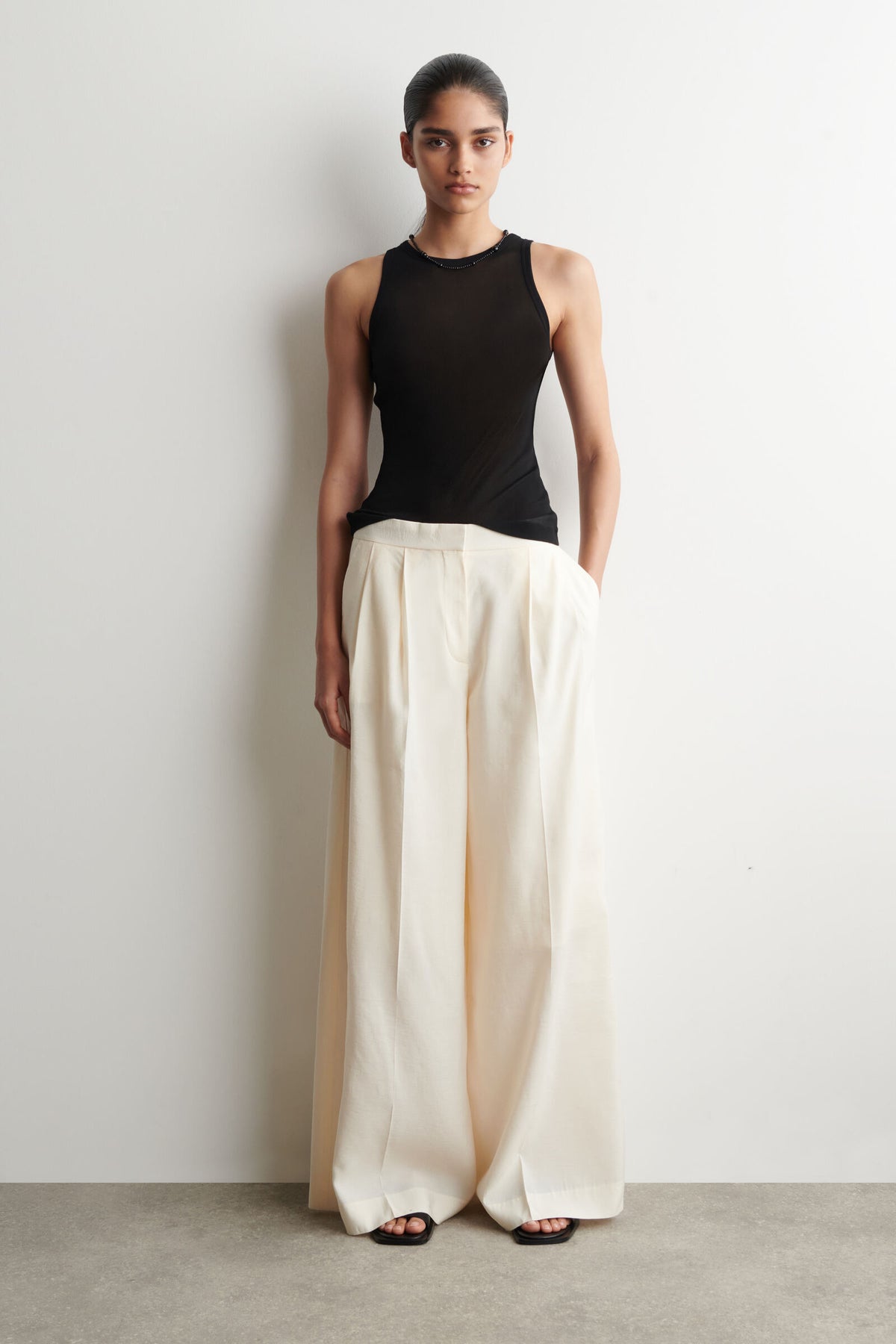 PANTALONES DE MODAL PLISADOS DE PIERNA ANCHA - CREMA