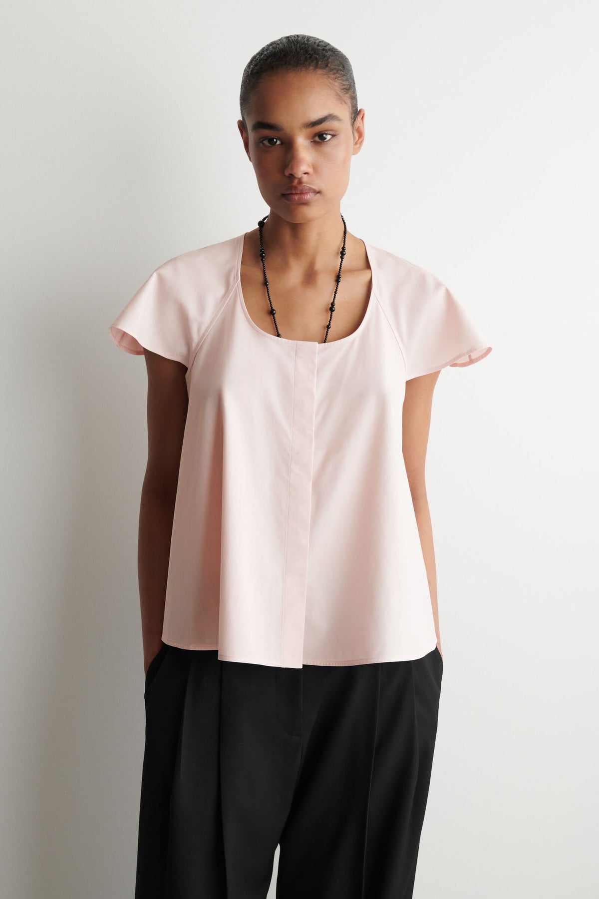BLUSA DE ALGODÓN CON MANGAS ACAMPANADAS - ROSADO