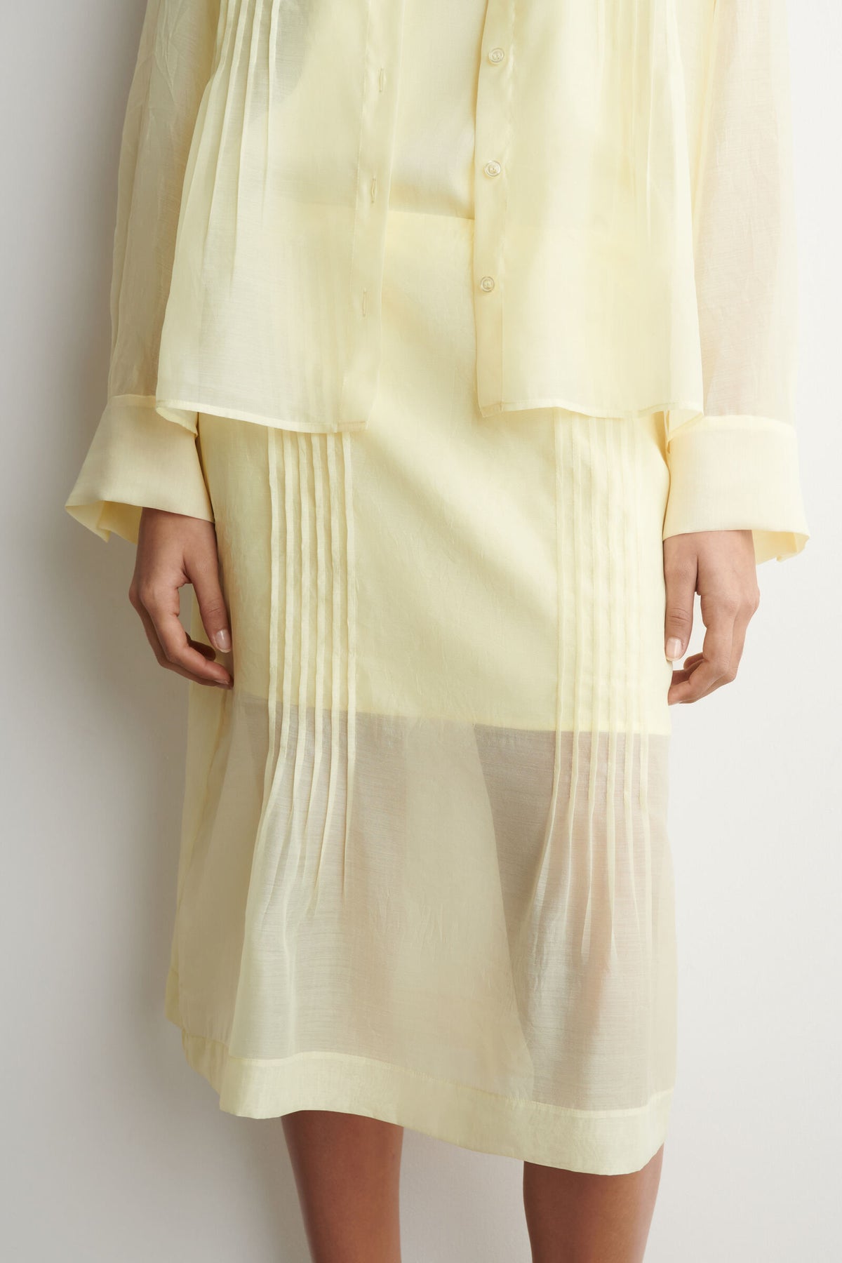 FALDA TRANSPARENTE CON PLISADO - AMARILLO