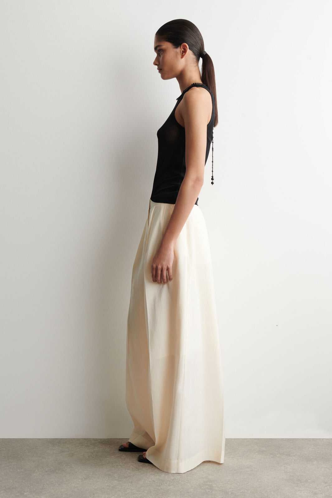 PANTALONES DE MODAL PLISADOS DE PIERNA ANCHA - CREMA