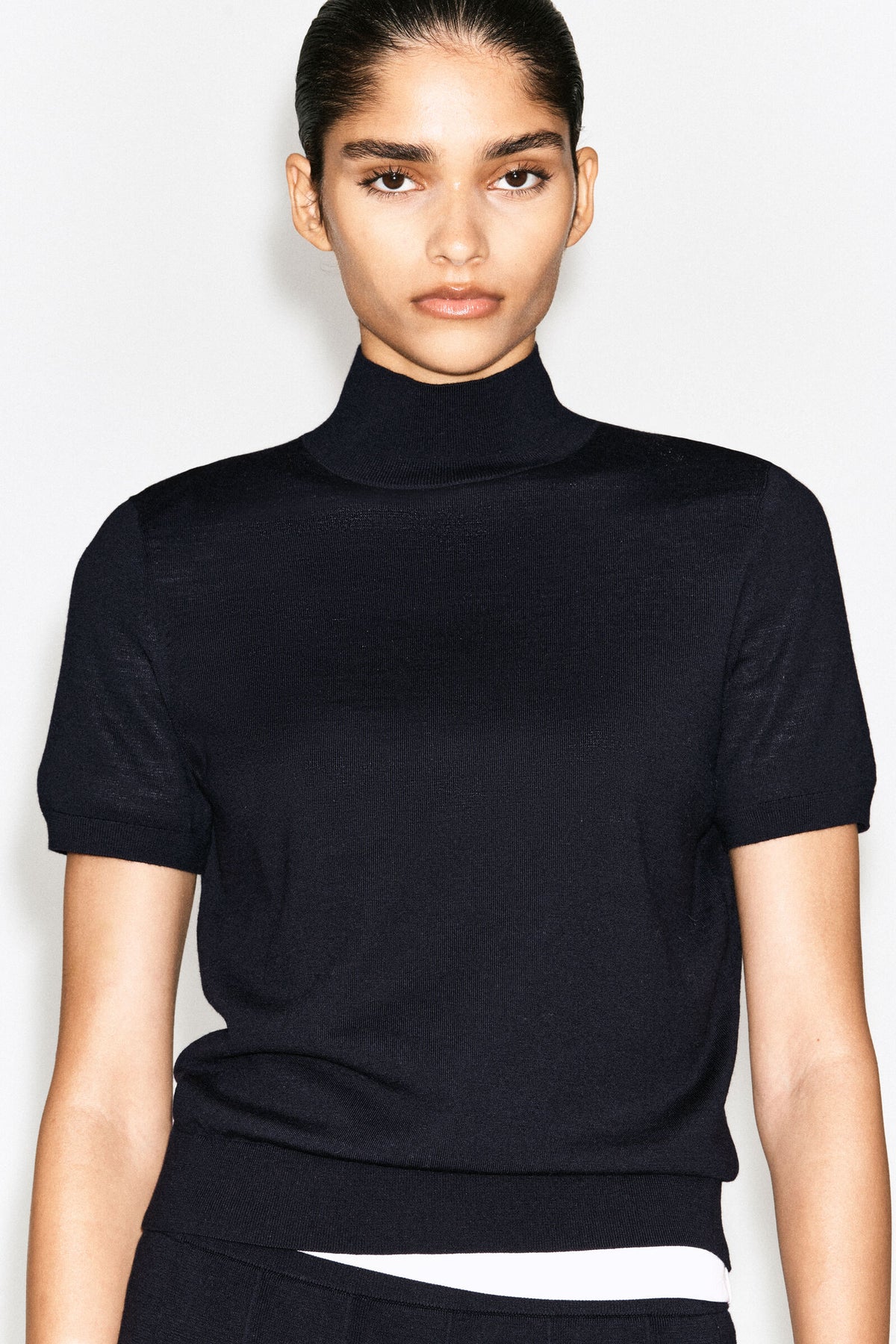 TOP DE CUELLO ALTO DE LANA MERINO - AZUL MARINO