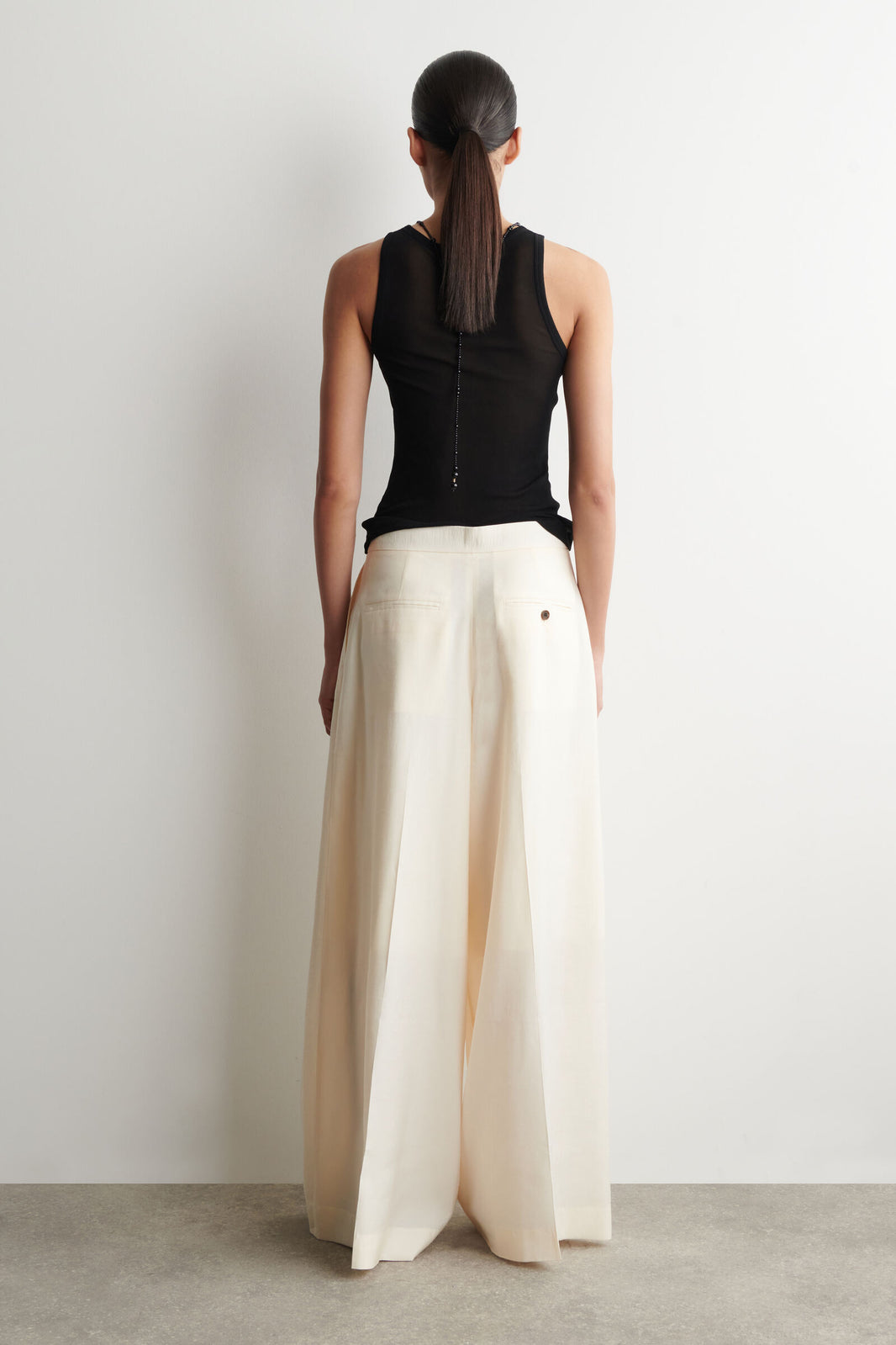 PANTALONES DE MODAL PLISADOS DE PIERNA ANCHA - CREMA