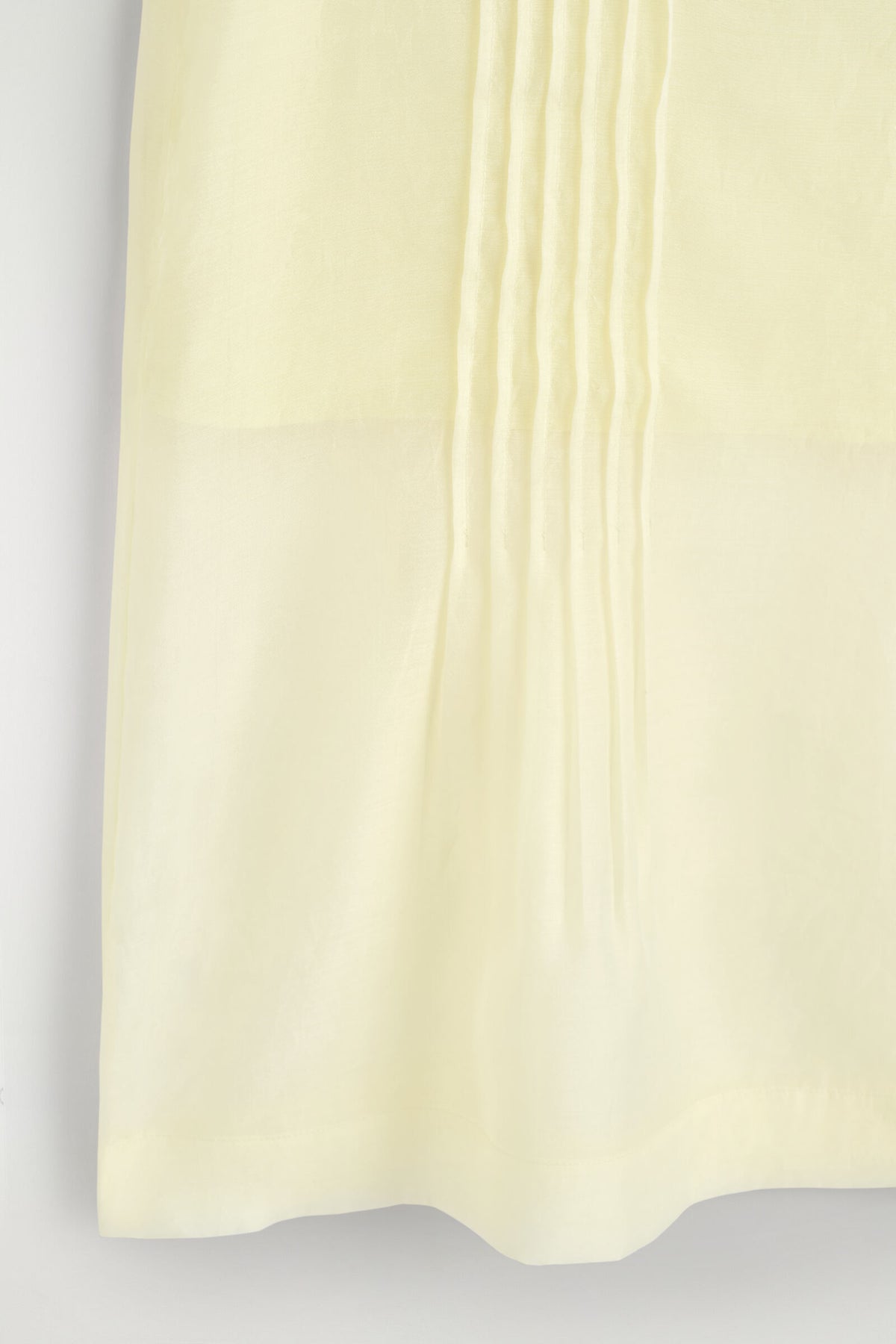 FALDA TRANSPARENTE CON PLISADO - AMARILLO | DescriptiveDetail