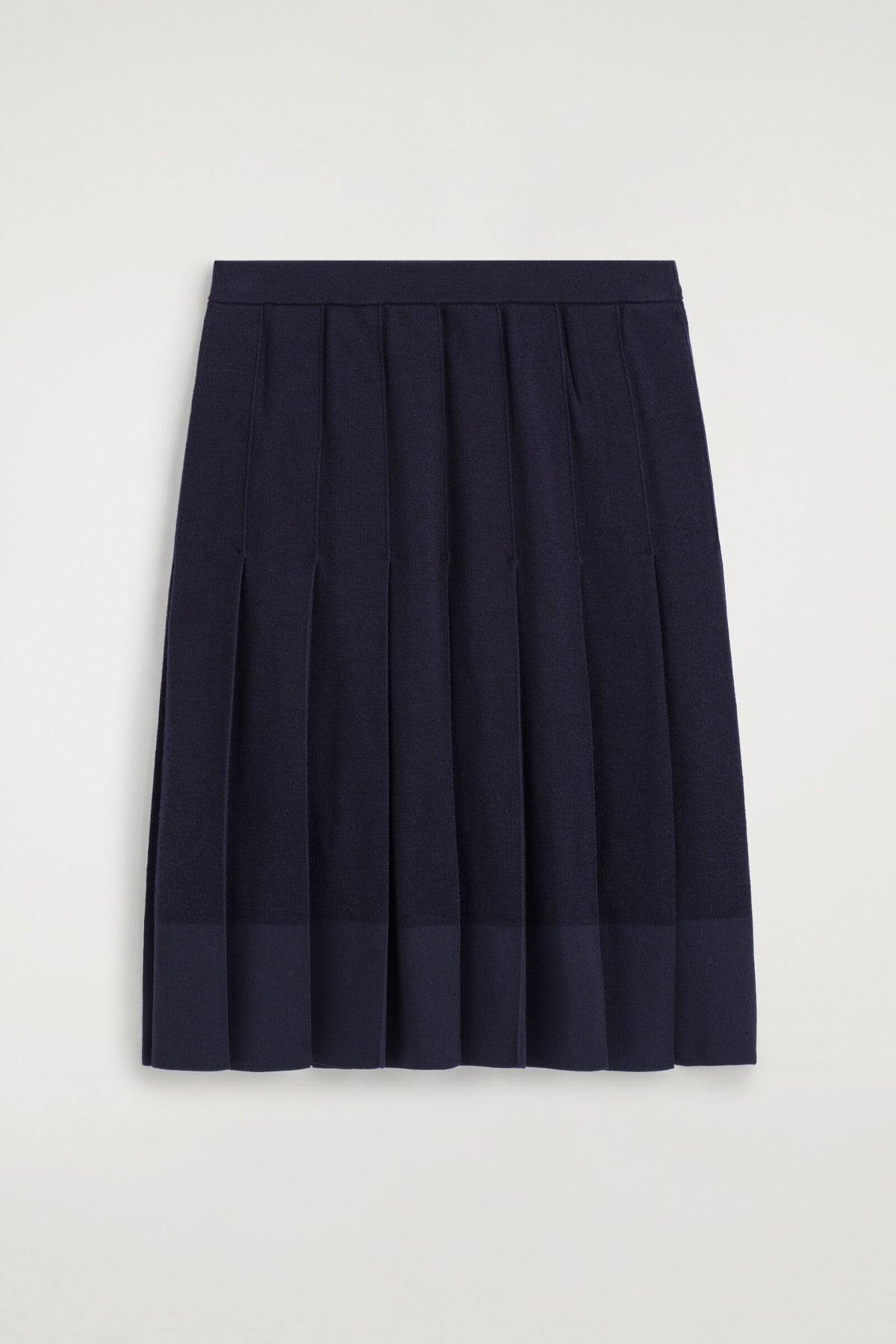 FALDA MIDI DE MERINO PLISADA - MARINO | DescriptiveStillLife