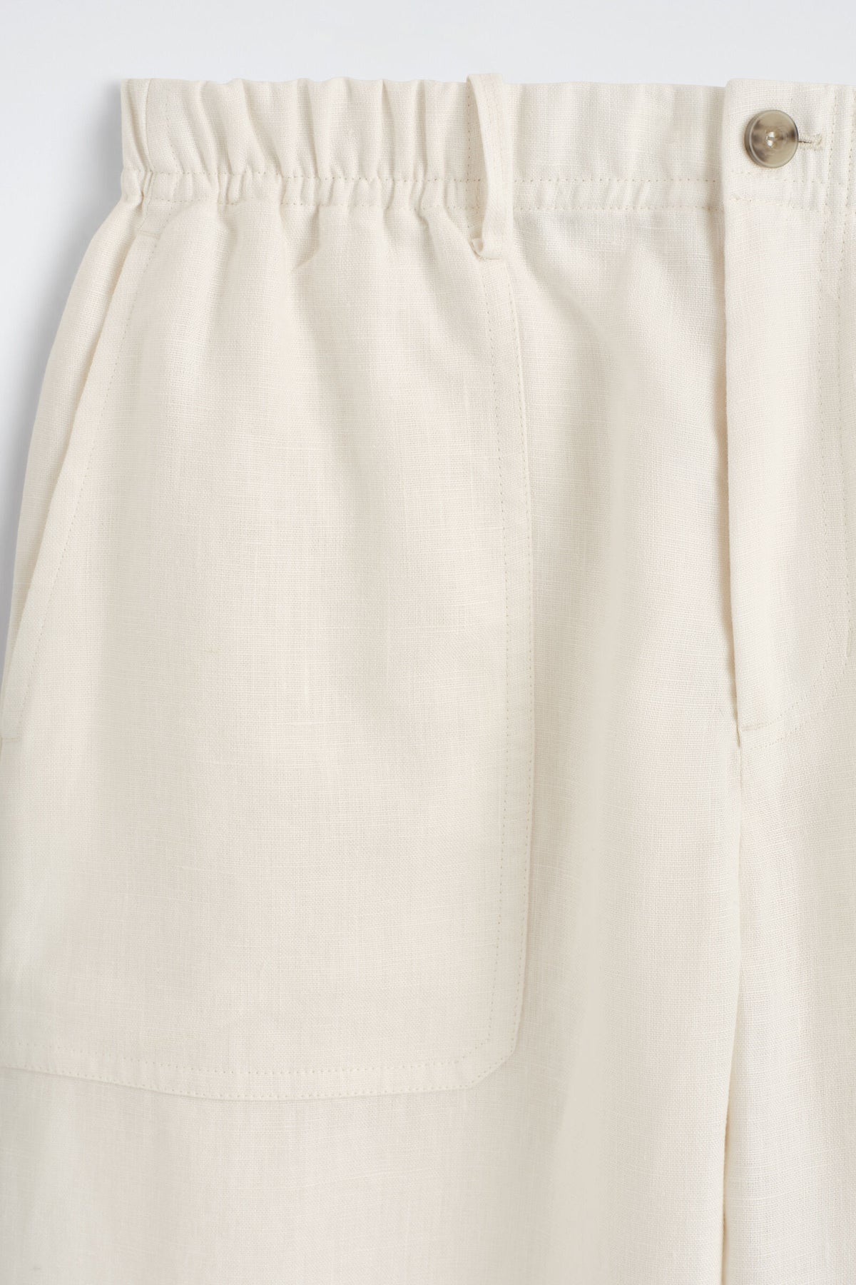 PANTALONES DE LINO DE CORTE RELAJADO Y PIERNA BARREL - BLANCO ROTO | DescriptiveDetail