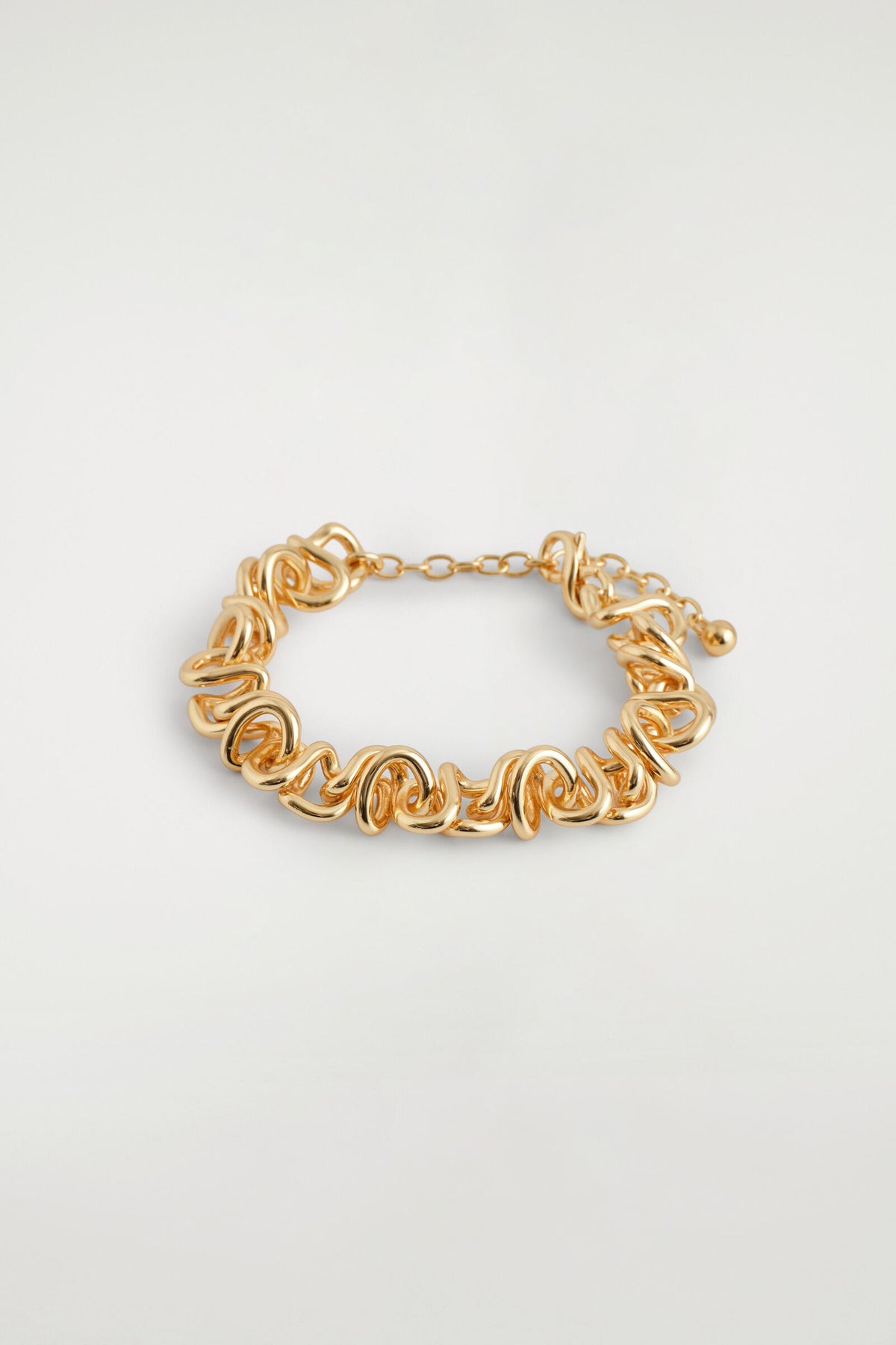 BRAZALETE DE CADENA ANUDADA - DORADO | DescriptiveDetail