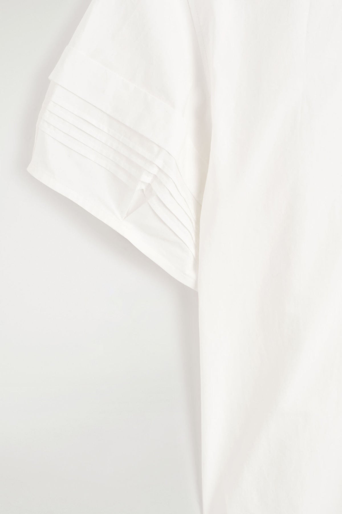 BLUSA DE ALGODÓN CON PLIEGUES - CRUDO | DescriptiveDetail