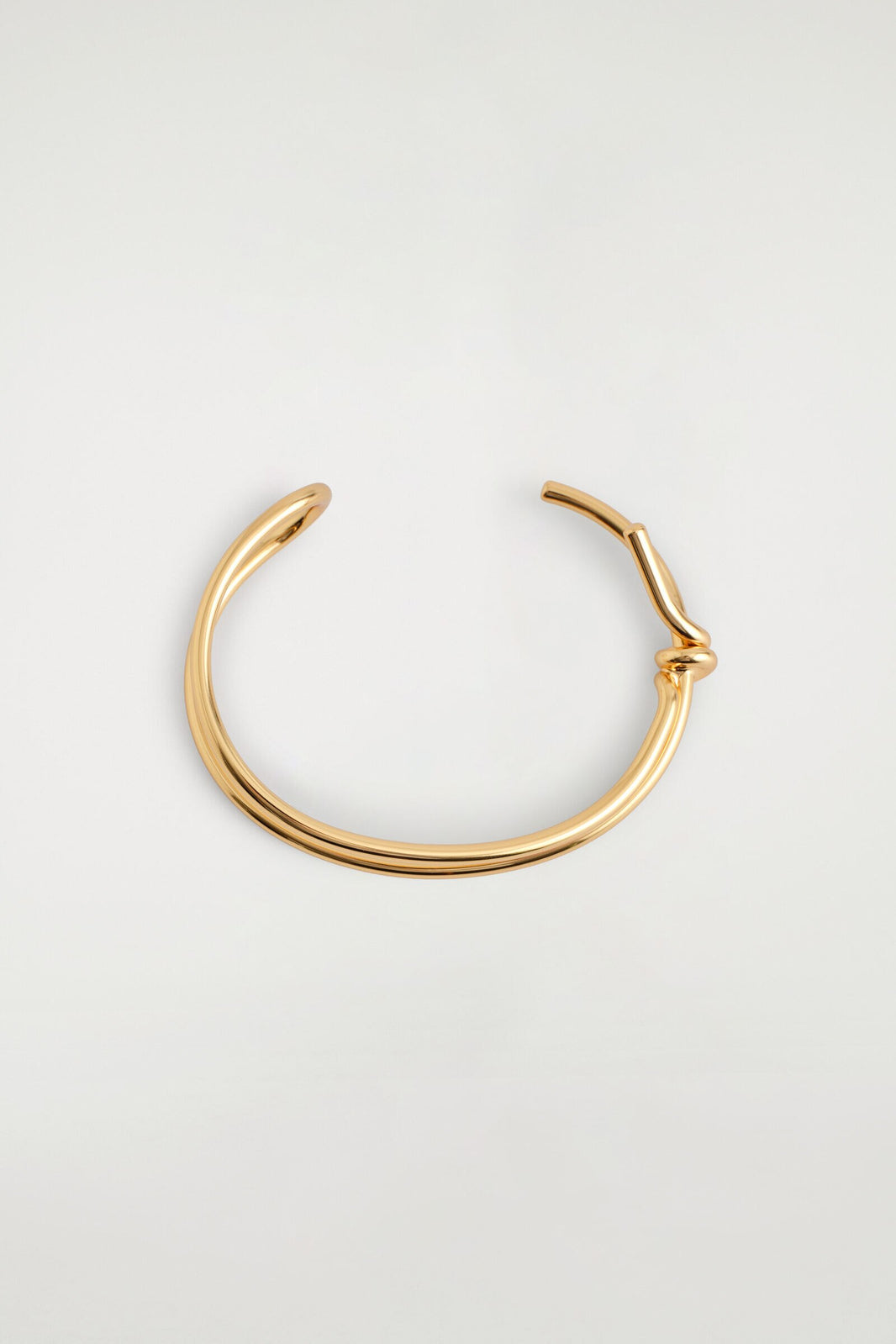 BRAZALETE ANUDADO - DORADO | DescriptiveDetail