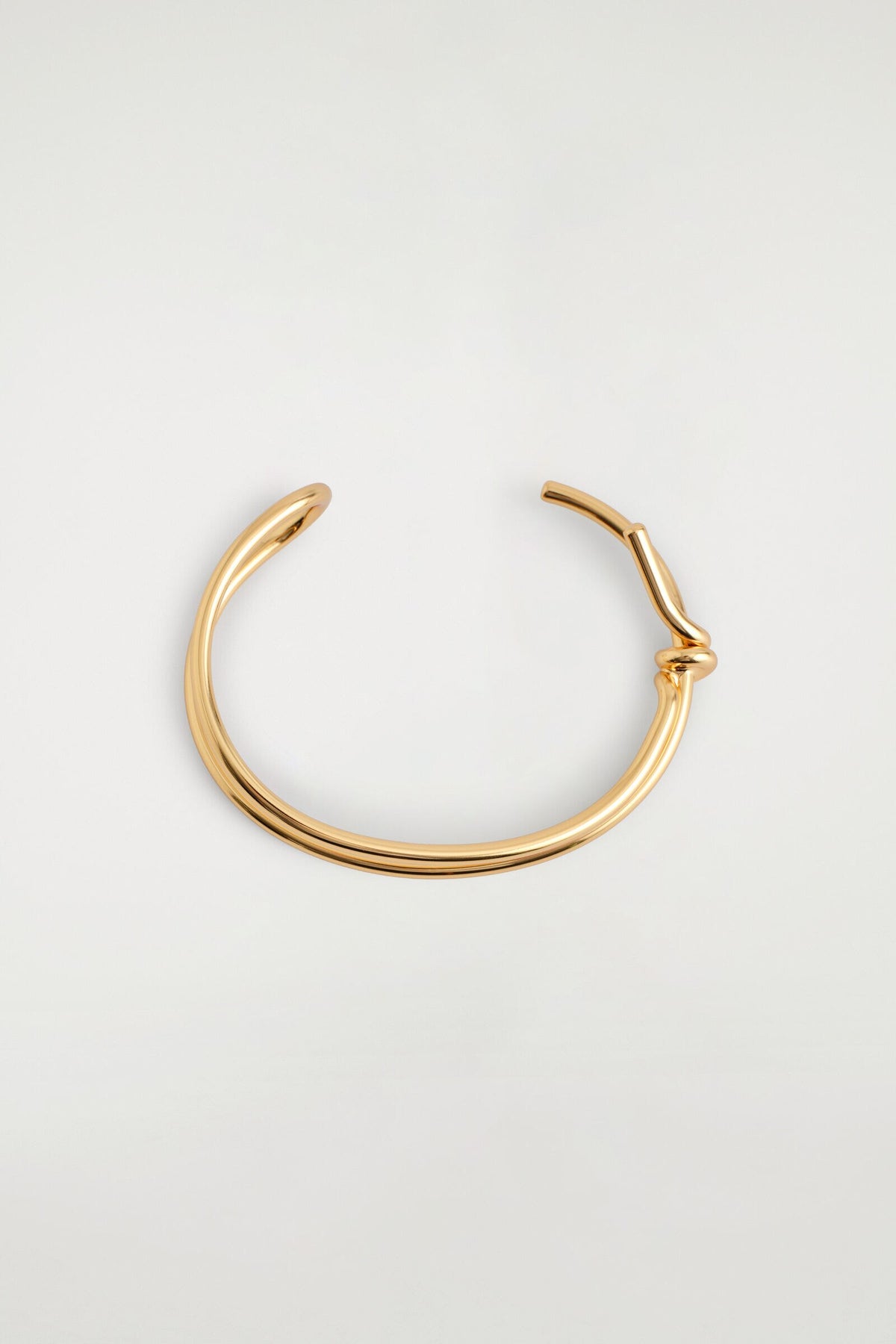 BRAZALETE ANUDADO - DORADO | DescriptiveDetail